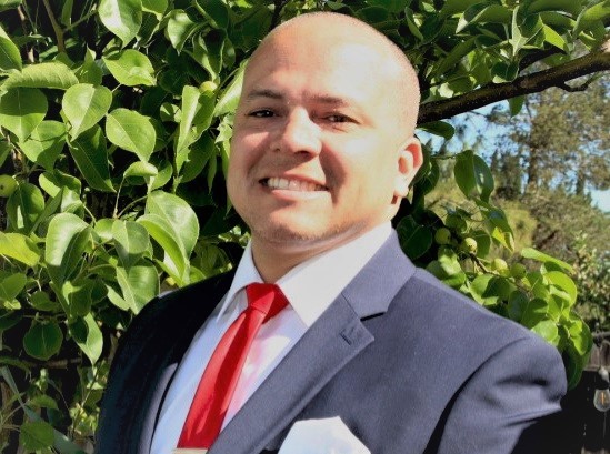 Man in a suit and red tie 