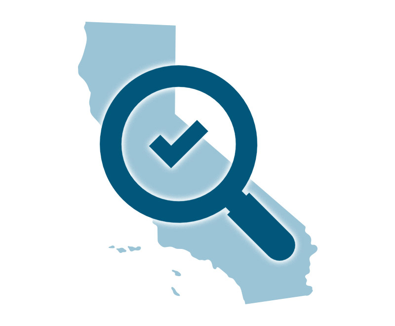 Image of a cutout of California with a Magnifying glass displayed over the cutout.