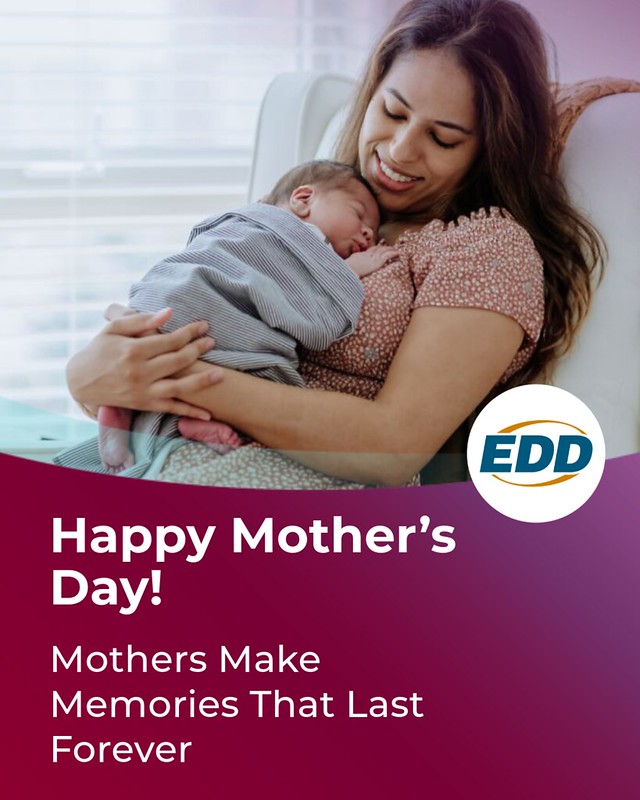 A mother sitting back in chair holding her sleeping baby. Under the photo is the EDD logo and a slogan reading “Happy Mother’s Day! Mothers Make Memories that Last Forever.”
